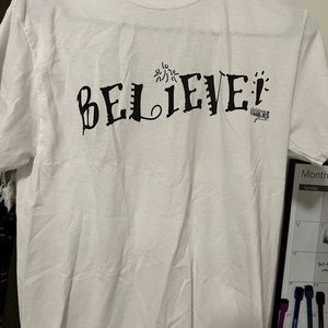 white Believe fundraiser tshirt
